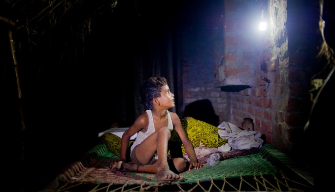 An Indian village home lit up through a micro-grid (Image by Karan Vaid)