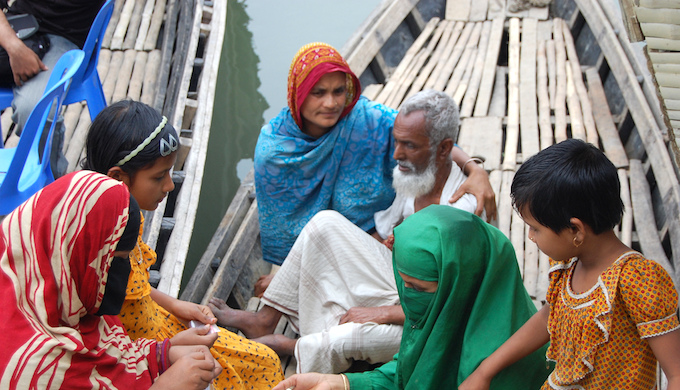 Frequent floods and cyclonic storms in South Asia are forcing people to migrate (Photo by Flickr) 