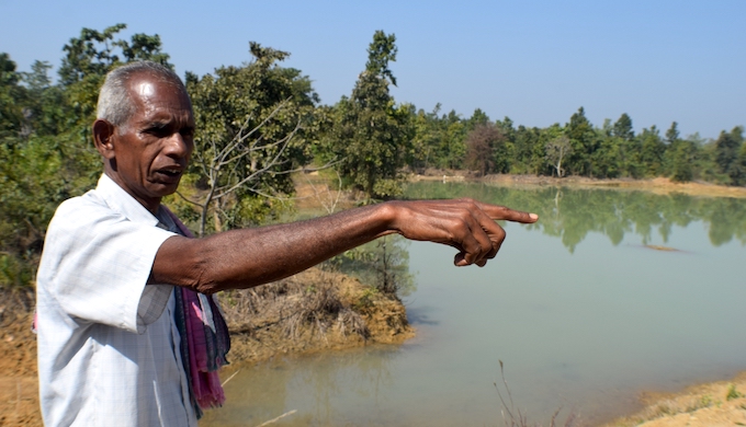 Byasadev Bhoi of Pandel village says the irrigation pond changed his life (Photo by Basudev Mahapatra)