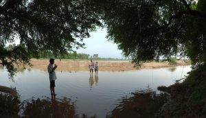 Farmers checking Pyne level, Nawada, Bihar