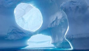 A large iceberg floating in Maxwell Bay in Antarctica (Photo by Eric Ghost / Alamy)
