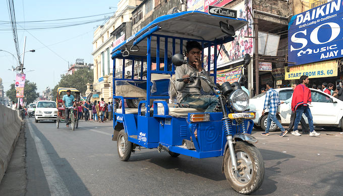 Electric 3-wheelers running on lead acid batteries have proliferated across Indian cities (Photo by Petr Svarc / Alamy)